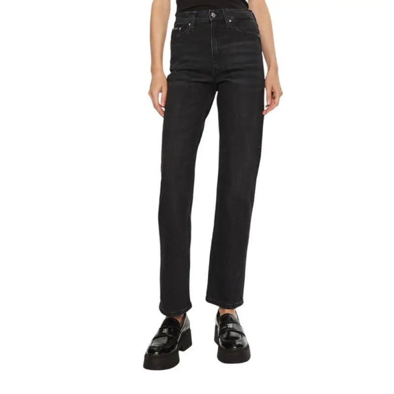 Black high-waisted denim jeans for women displayed in a retail product image