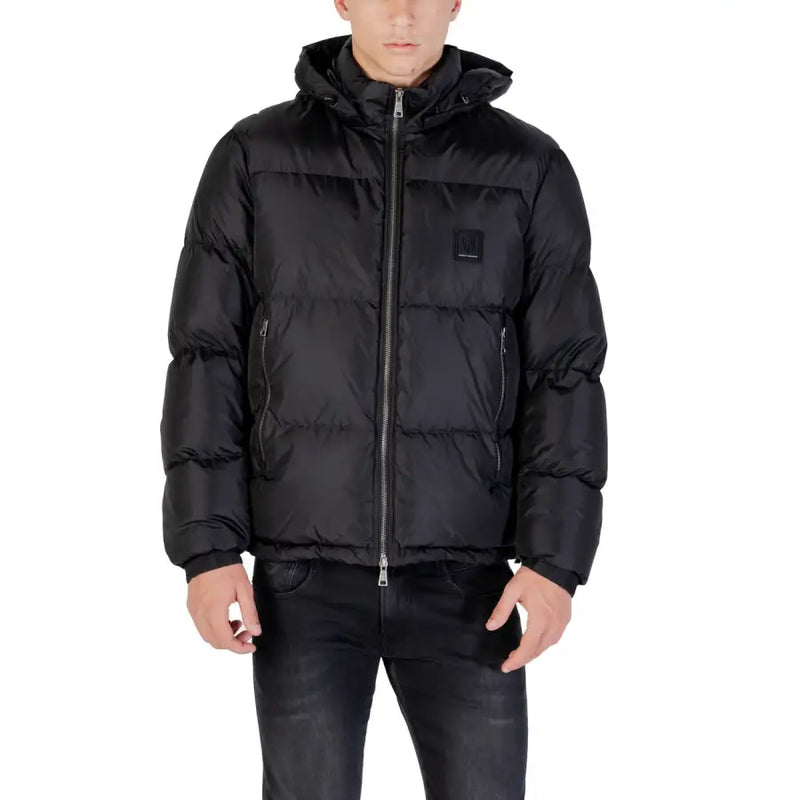 Black hooded puffer jacket in black with quilted design and a small rectangular logo patch on the chest