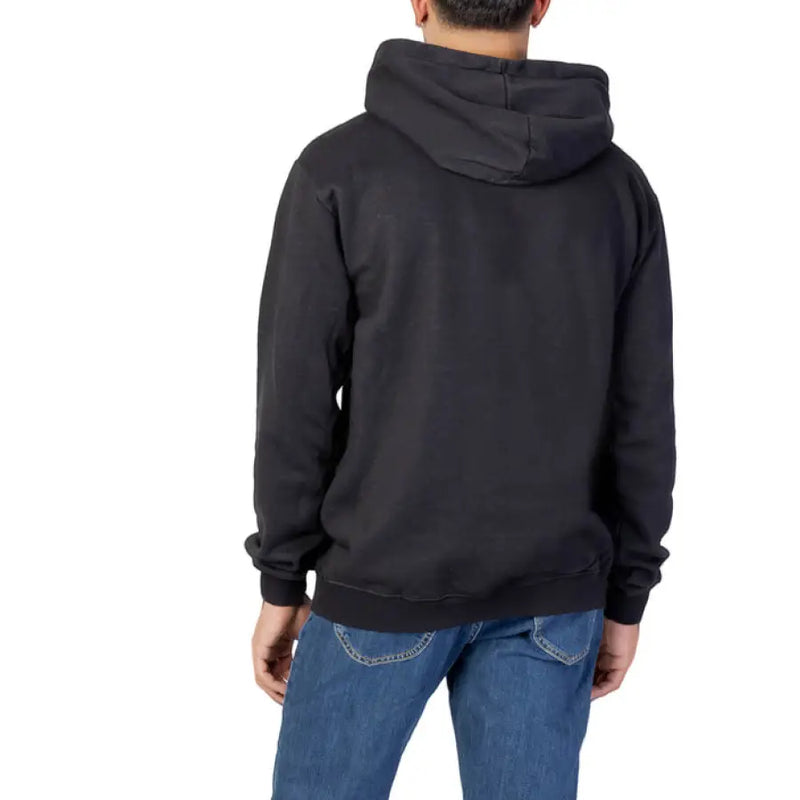 Black Fila hooded sweatshirt shown in a clothing product display