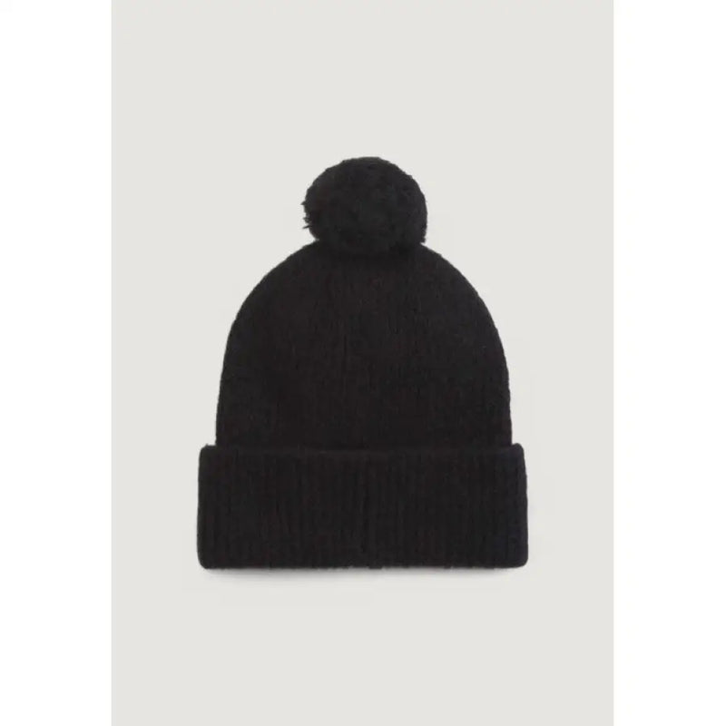 Black knit beanie with pompom, stylish winter accessory for warmth and fashion