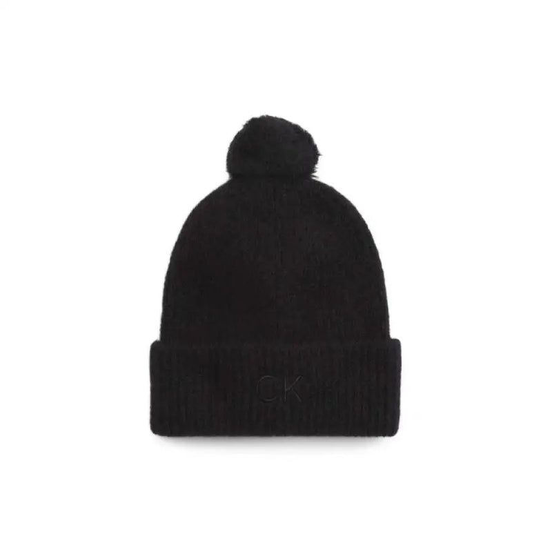 Black knit beanie with pompom for cozy winter style from Black Knit Beanie With Pompom collection