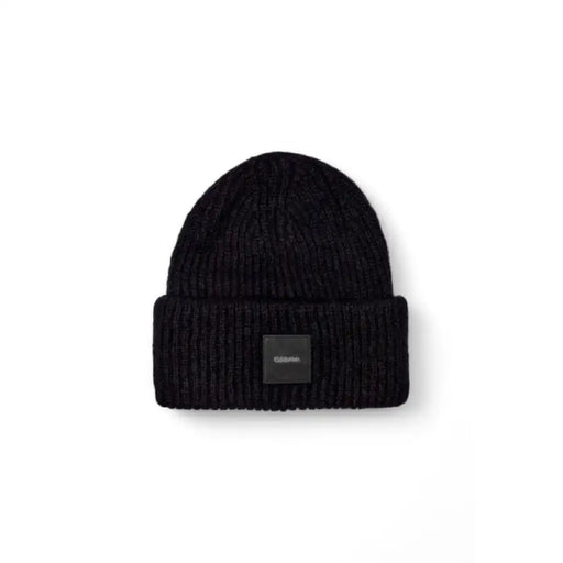 Black knit beanie showcased as part of the Teal Knit Beanie product line