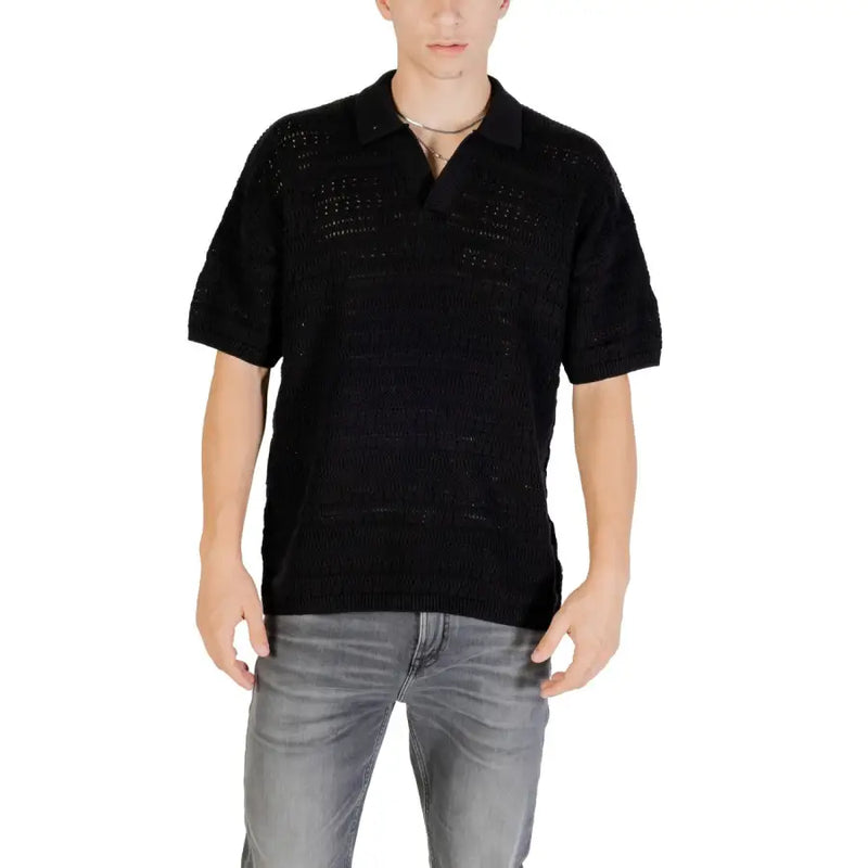 Black knit polo shirt with short sleeves and a textured openwork pattern made from soft fabric