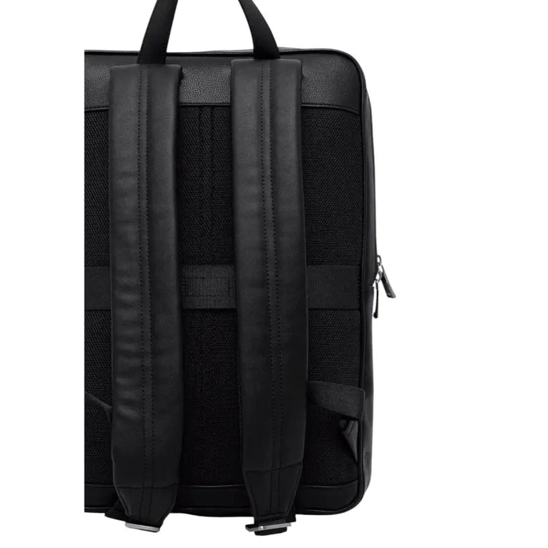 Black leather backpack with padded straps and silver zippers for stylish comfort