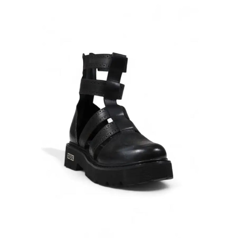 Black leather gladiator style platform boot displayed in a product image