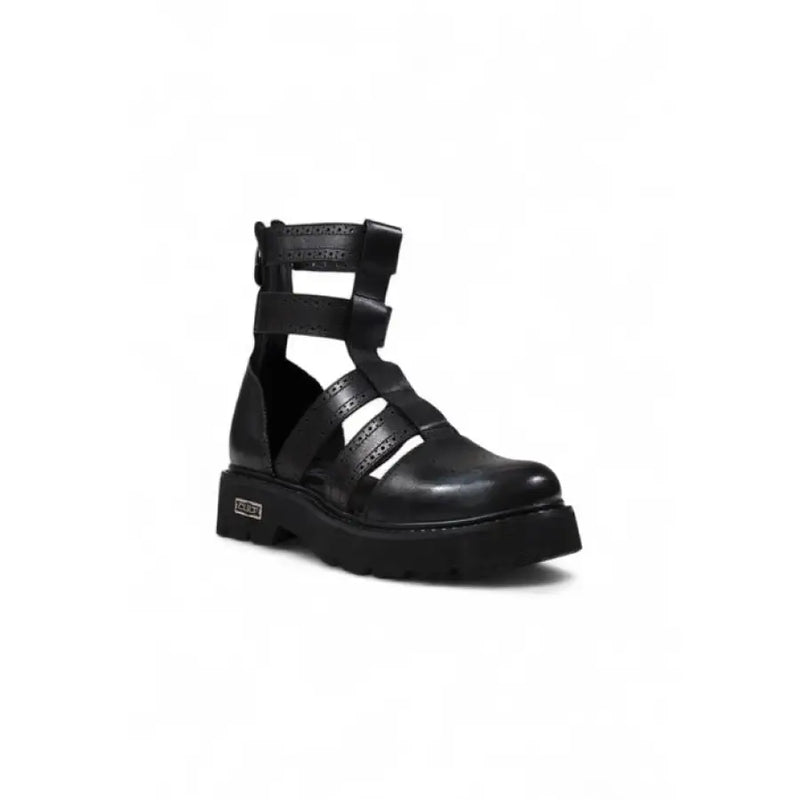 Black leather gladiator platform boot showcasing urban-inspired design and high-quality craftsmanship