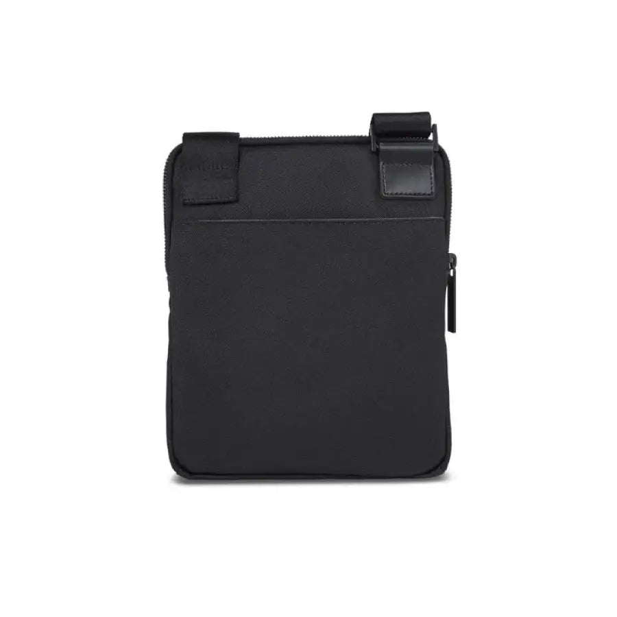 
                      
                        Calvin Klein small black leather pouch for phone, embodying urban city fashion
                      
                    