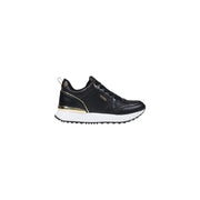 Black leather women’s slip-on sneakers with gold accents and white soles for Guess Fall Winter collection
