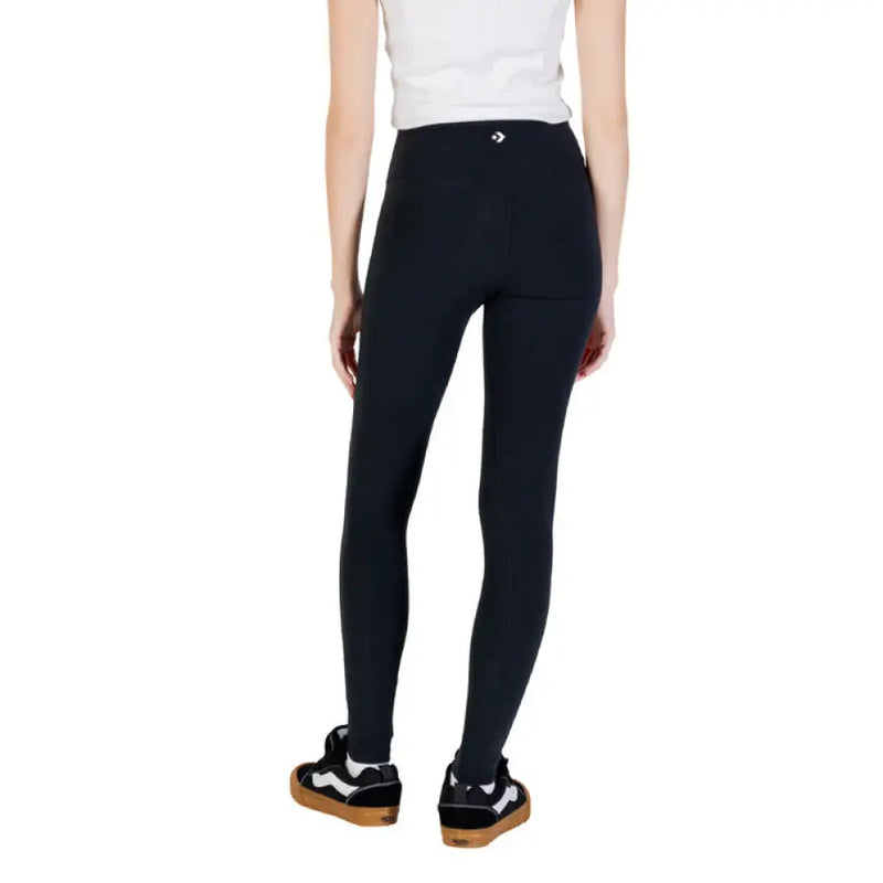 Black leggings with ruffled waistband, stylish and comfortable activewear piece