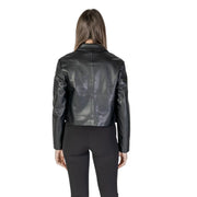 Black leather moto jacket with sleek glossy finish and classic collar paired with black long polyurethane blazer with front pockets