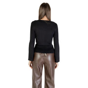 Black ribbed knit long-sleeve top with round neck and rhinestones for women in a classic sweater style