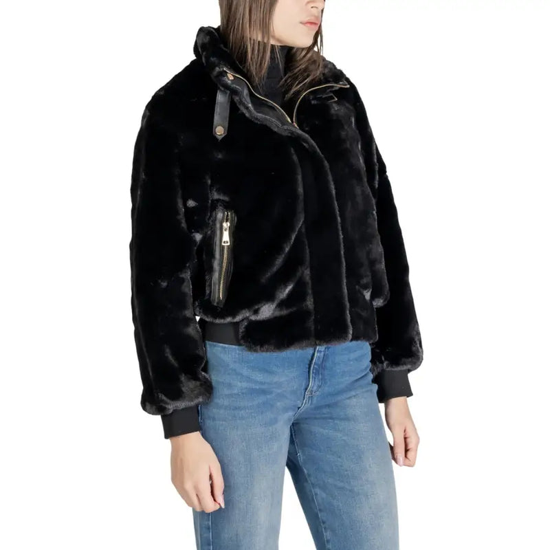 Black polyester blazer for women featuring gold-tone zippers, pockets, high collar, and faux fur bomber jacket style