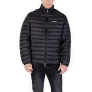 Men’s black quilted puffer jacket displayed on a mannequin for cold weather fashion