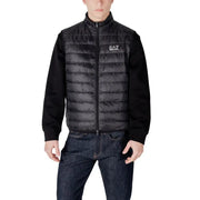 Black quilted vest with knit sleeves displayed in the Black Quilted Vest with Knit Sleeves product