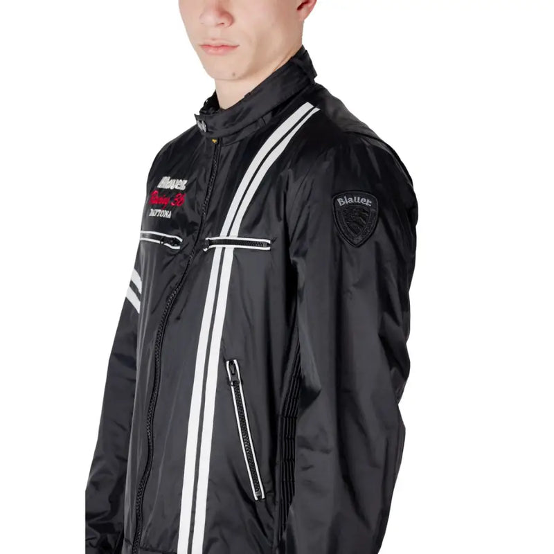 Black racing style motorcycle jacket in black leather with white racing stripes and red logo accents shown from back side