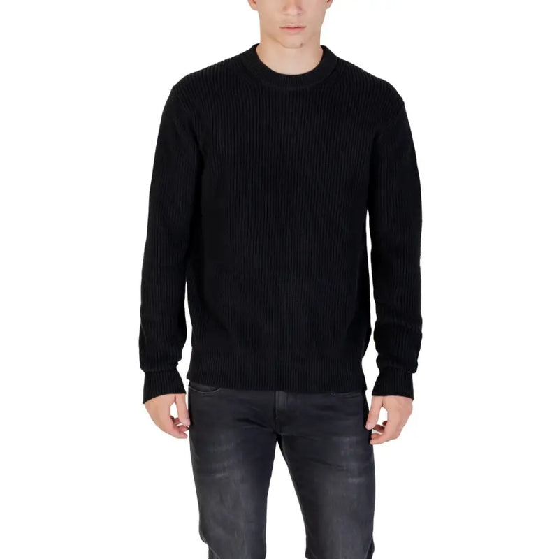 Black ribbed knit sweater showcased in the Black Ribbed Knit Sweater product image