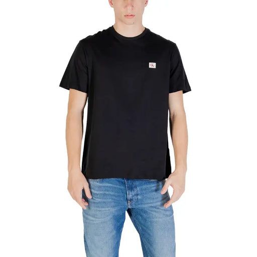 Black crewneck T-shirt displayed on a product page for Black Short Sleeve Crewneck T-Shirt