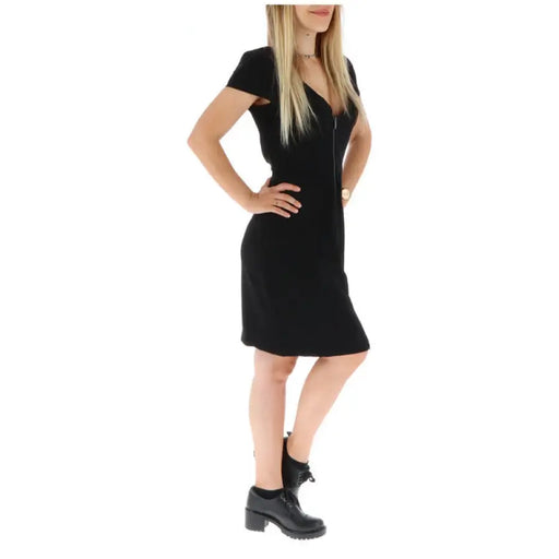 Black short-sleeved V neck sheath dress with back cutout and front zipper
