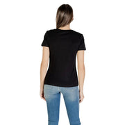 Black short-sleeve Guess Active women T-shirt paired with blue jeans