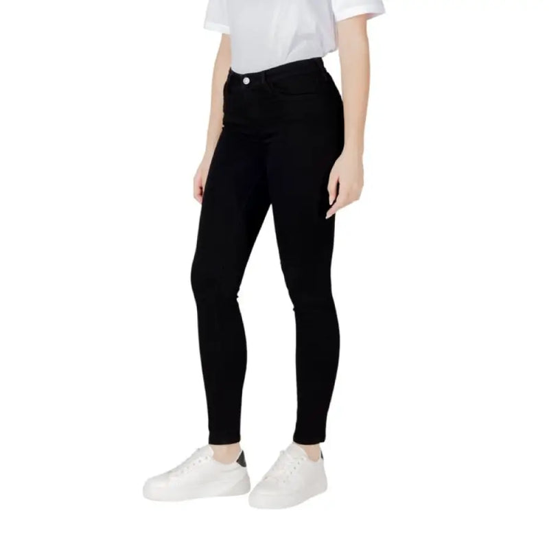 Black skinny jeans displayed as a product named Black Skinny Jeans on a fashion website