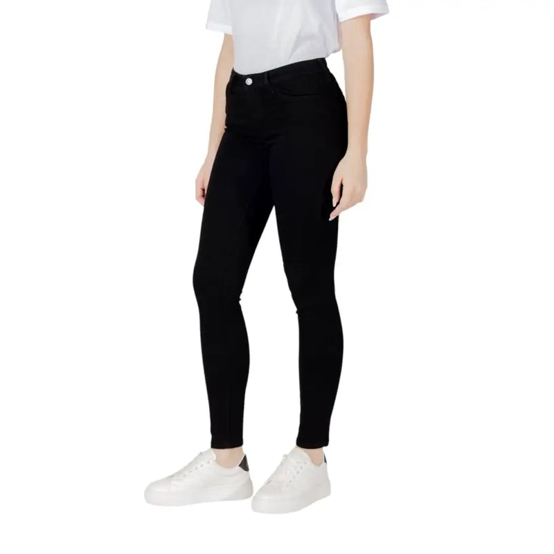 Schwarze Skinny-Jeans mit elegantem, figurbetontem Design und hohem Bund aus glattem, schwarzem Stoff