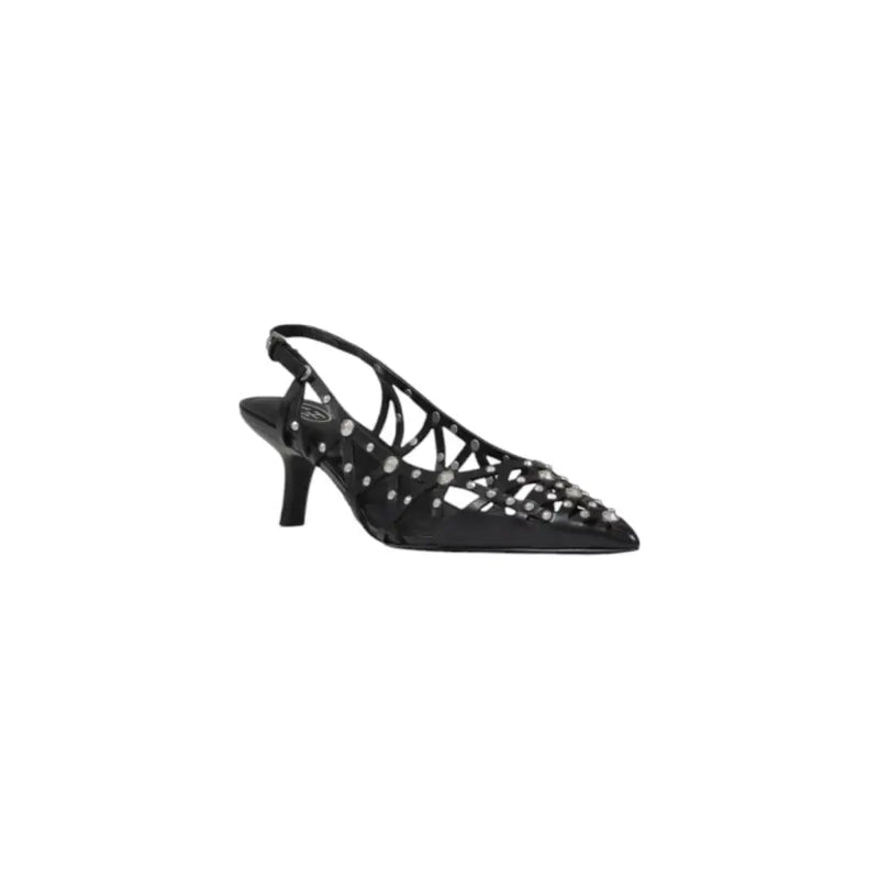 Black leather slingback pump with pointed toe, silver stud embellishments on crisscross straps and heel