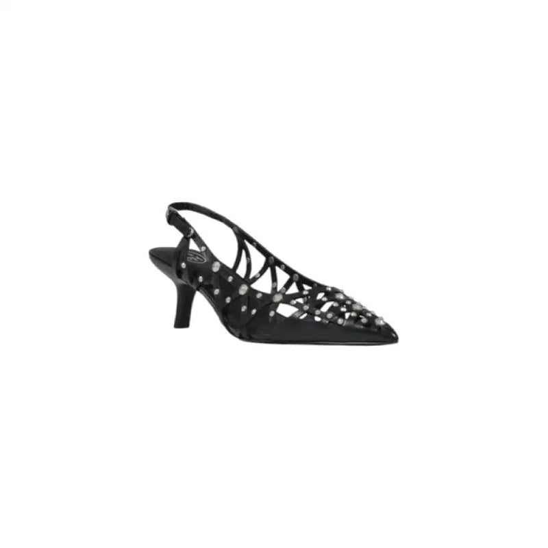 Black slingback heel with decorative cutouts, featured in the Black Slingback Heel with Decorative Embellishments product