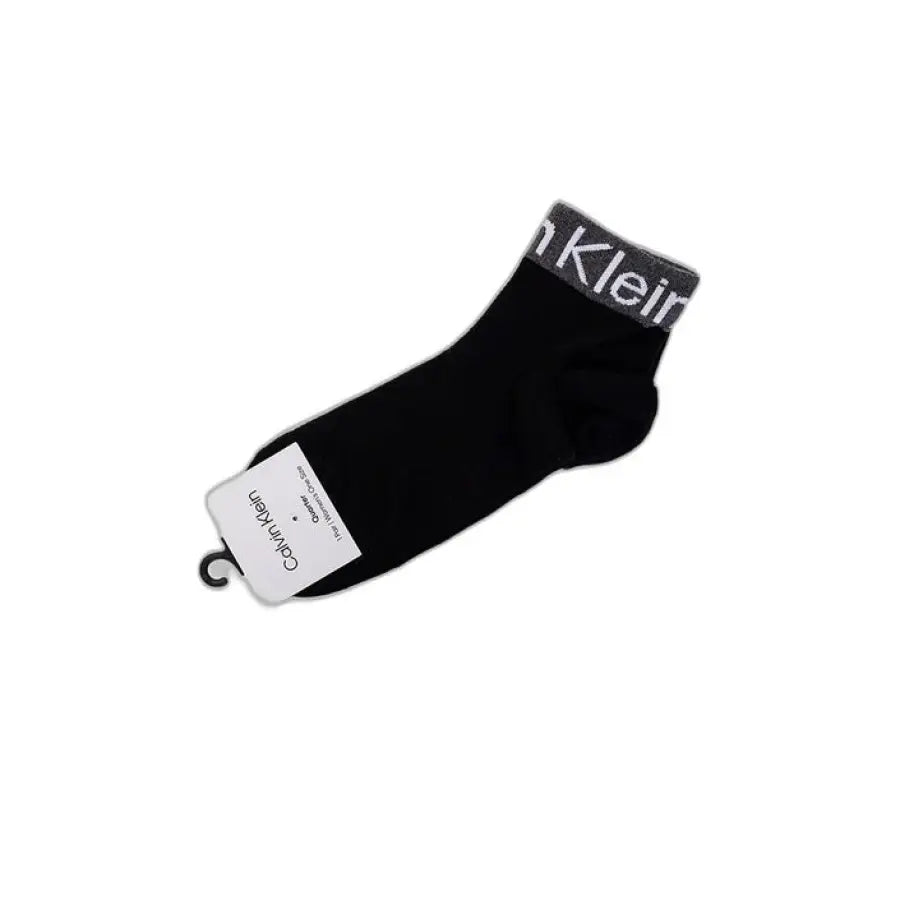 Calvin Klein black sock with white tag, urban city fashion accessory