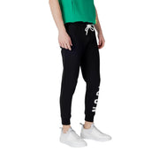 Black sweatpants with white drawstring featuring vertical lettering on the side made of comfortable jogger material