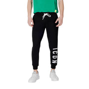 Black sweatpants with white drawstring featuring vertical icon lettering on the left leg made from soft fabric