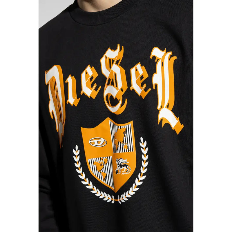 Black diesel sweatshirt in black featuring a bold orange and white embroidered gothic logo above a shield emblem