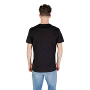 Black T shirt with square logo paired with blue jeans from Tommy Hilfiger