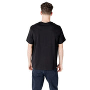 Black Calvin Klein T shirt paired with dark blue jeans for a stylish casual look
