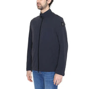 Black turtleneck jacket for men in nylon and spandex with dark navy blue zip up and textured fabric with logo patch