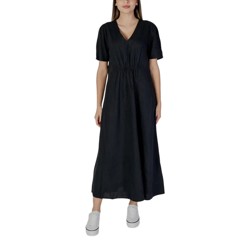 Black v-neck short dress by B.young with short sleeves and gathered waist in a midi length design