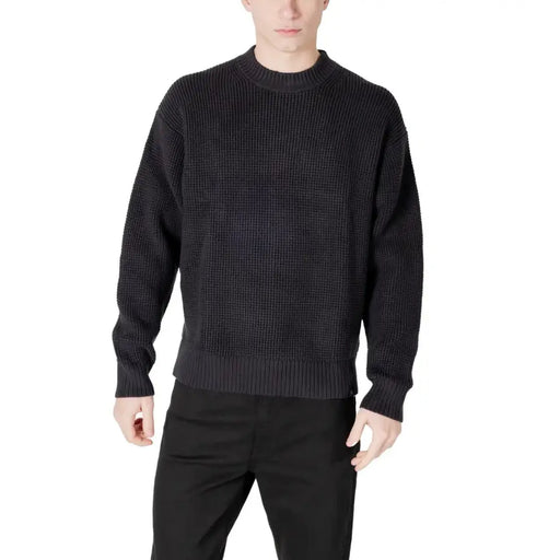 Black waffle-knit sweater displayed in a product named Black Waffle Knit Sweater