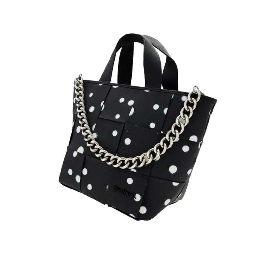 
                      
                        Desigual women bag in black and white polka dot design
                      
                    