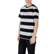Black and white striped t-shirt displayed on a mannequin for fashion product showcase
