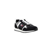 Black and white Tommy Hilfiger sneaker displayed in the product listing