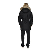 Black women’s jacket with hood front pockets black puffer parka with tan fur-lined hood and drawstring waist