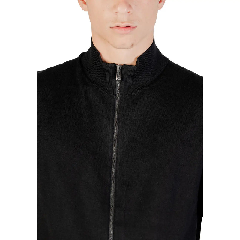 Black ribbed knit zip-up jacket with high collar and silver zipper from Armani Exchange knitwear collection
