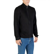 Black zip turtleneck knitwear by Armani Exchange featuring a high collar and ribbed cuffs in knit fabric
