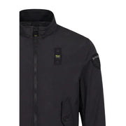 Schwarzer blauer Herrenblazer mit Polyamid-Reißverschluss und Rollkragenjacke, die die Rückseite des Kleidungsstücks zeigt