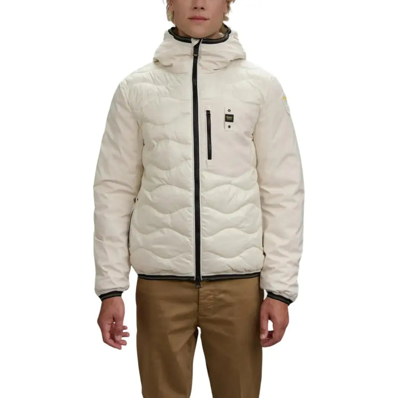 Cream quilted puffer jacket with black accents and hood.