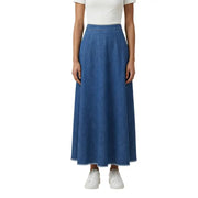 Blue cotton skirt for women spring summer featuring flowing medium-wash denim maxi design with frayed hem