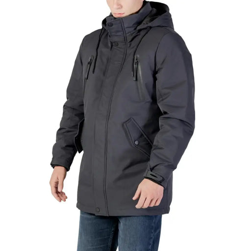 Charcoal gray waterproof parka with hood and zipper details.