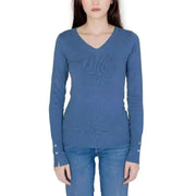 Guess Women Knitwear: Blue long-sleeved V-neck sweater styled with jeans