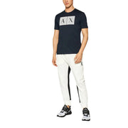 Navy blue short-sleeved t shirt with a white geometric AX logo across the chest for casual wear