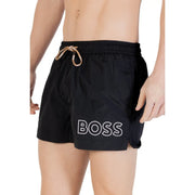 Black Boss men swimwear trunks in polyamide with white outlined logo and tan drawstring lace up pockets
