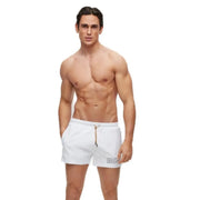 White boss men swimwear black polyamide lace up swim trunks with gold-tone drawstring and subtle logo on lower left leg